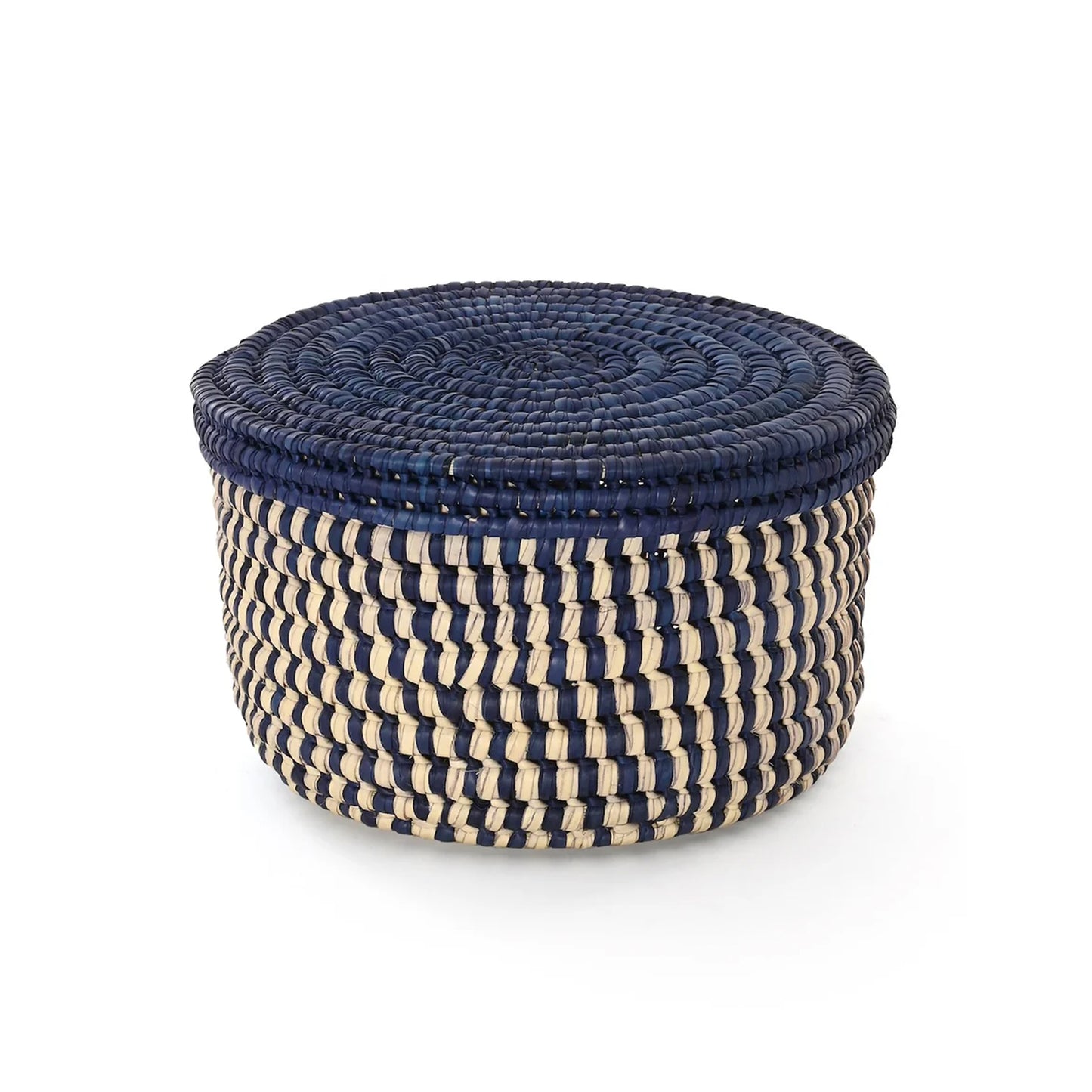 A round woven storage basket with a lid, featuring a navy blue top and alternating navy and natural beige woven stripes on the body, 8.5 x 5 inches 