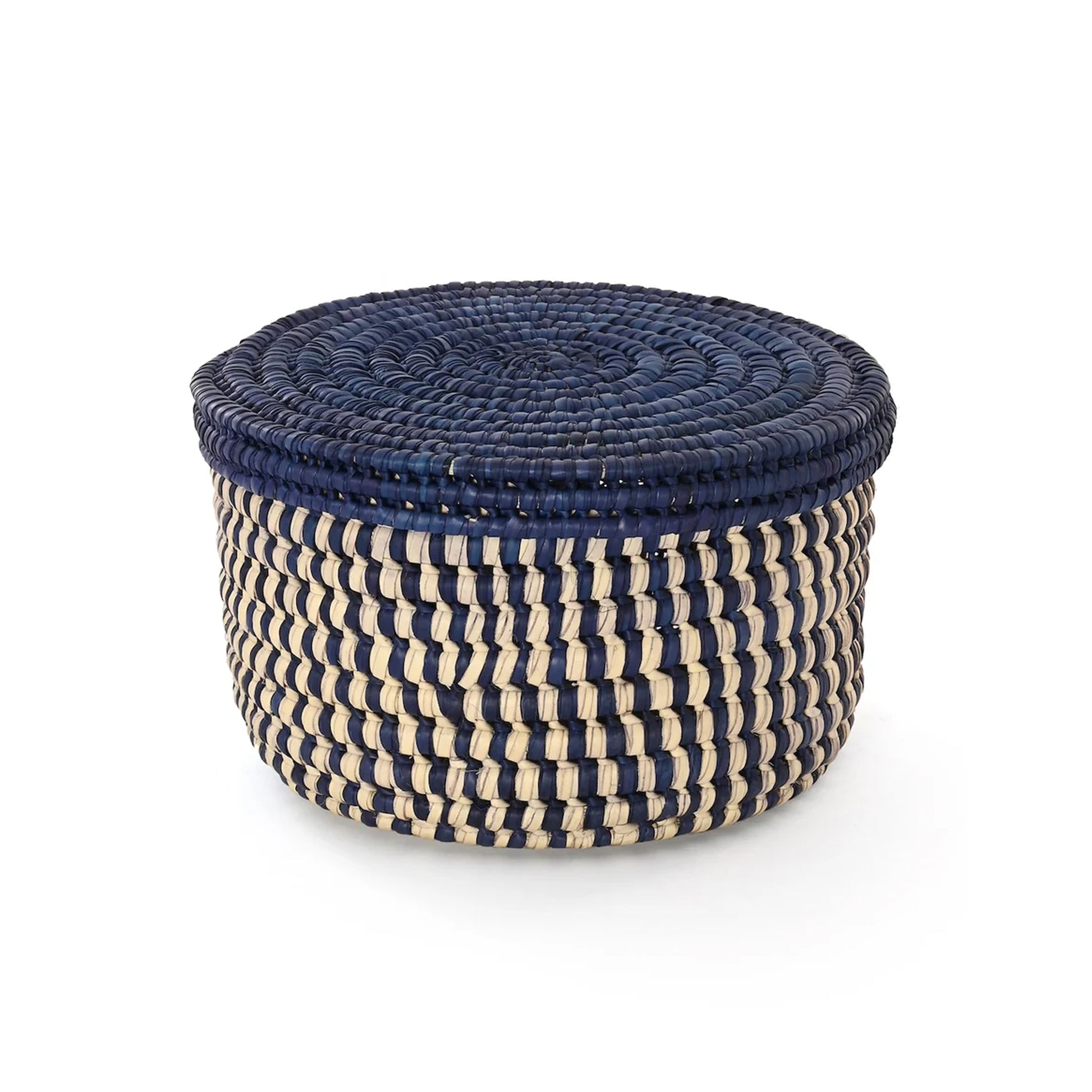 A round woven storage basket with a lid, featuring a navy blue top and alternating navy and natural beige woven stripes on the body, 8.5 x 5 inches 