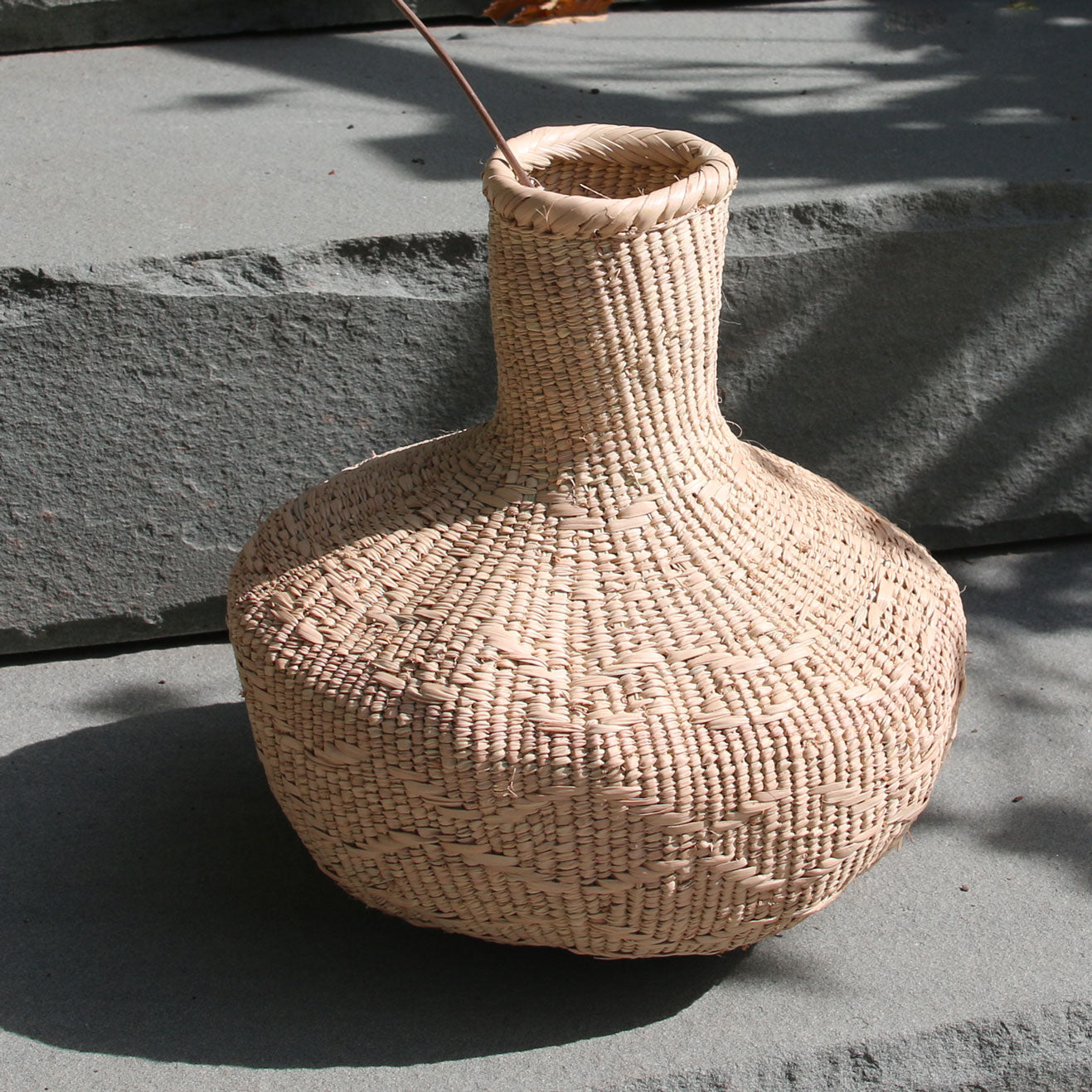 decorative-long-stem-gourd-woven-palm-leaf-basket
