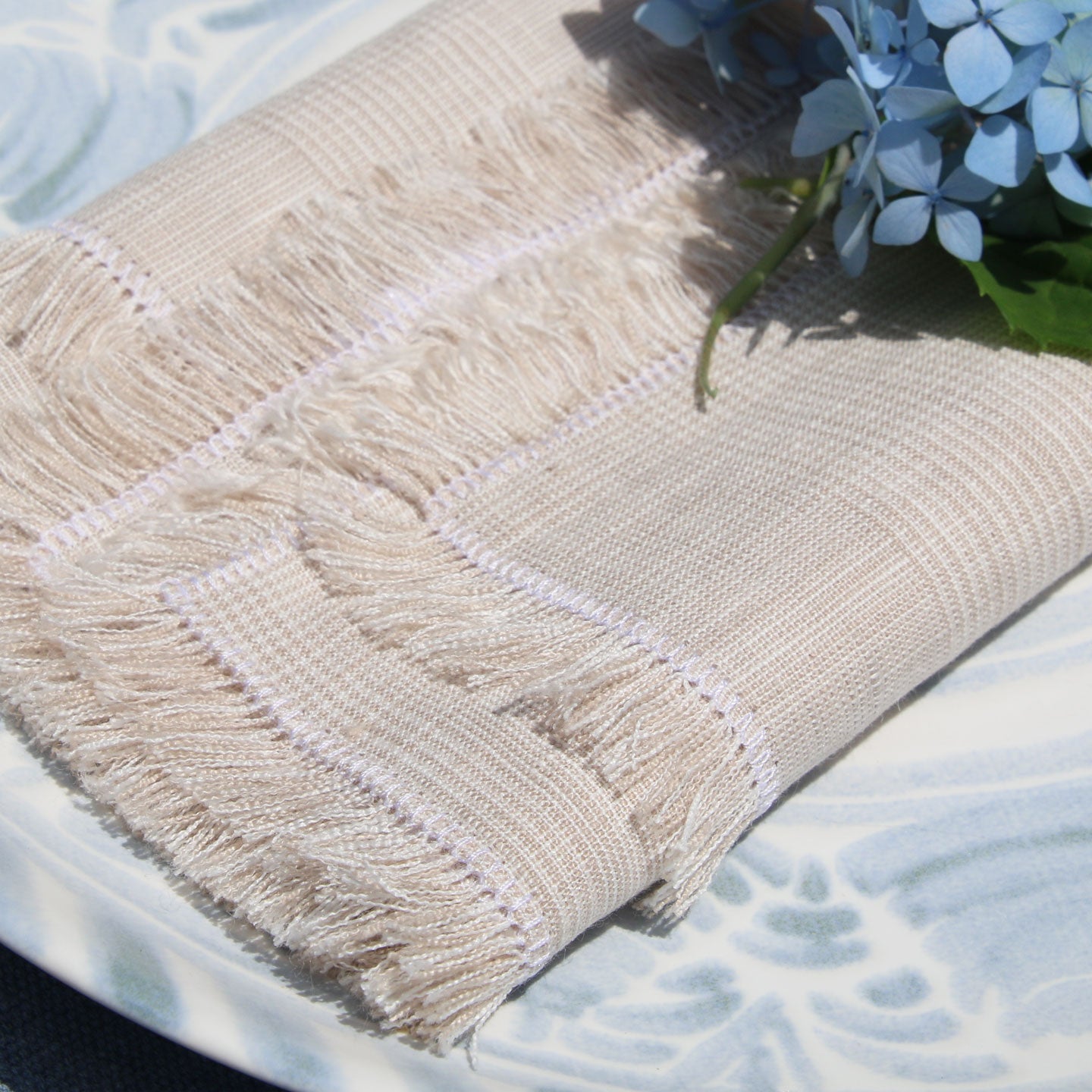  Analyzing image      wheat-white-fringe-dinner-napkin-handmade-in-usa-by-kate-stoltz