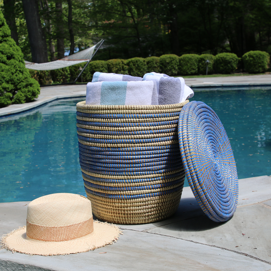 white-and-blue-handwoven-towel-laundry-storage-hamper